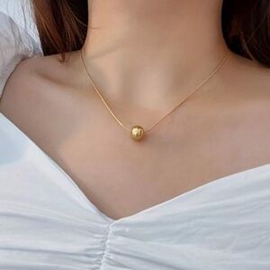 Gold ball necklace